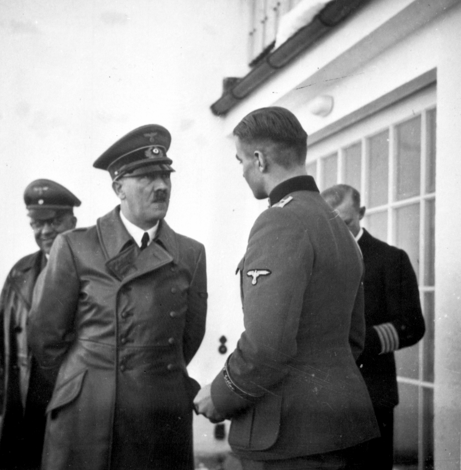 Adolf Hitler talking to Max Wünsche on the Berghof terrace early January 1940, from Eva Braun's albums